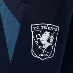 Castore FC Twente Trainingspak 1/4-Zip 2026-2027 Kids Lichtblauw Donkerblauw Donkergrijs