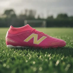 New Balance Tekela V5 Team Gras Voetbalschoenen (FG) Kids Felroze Wit Goud