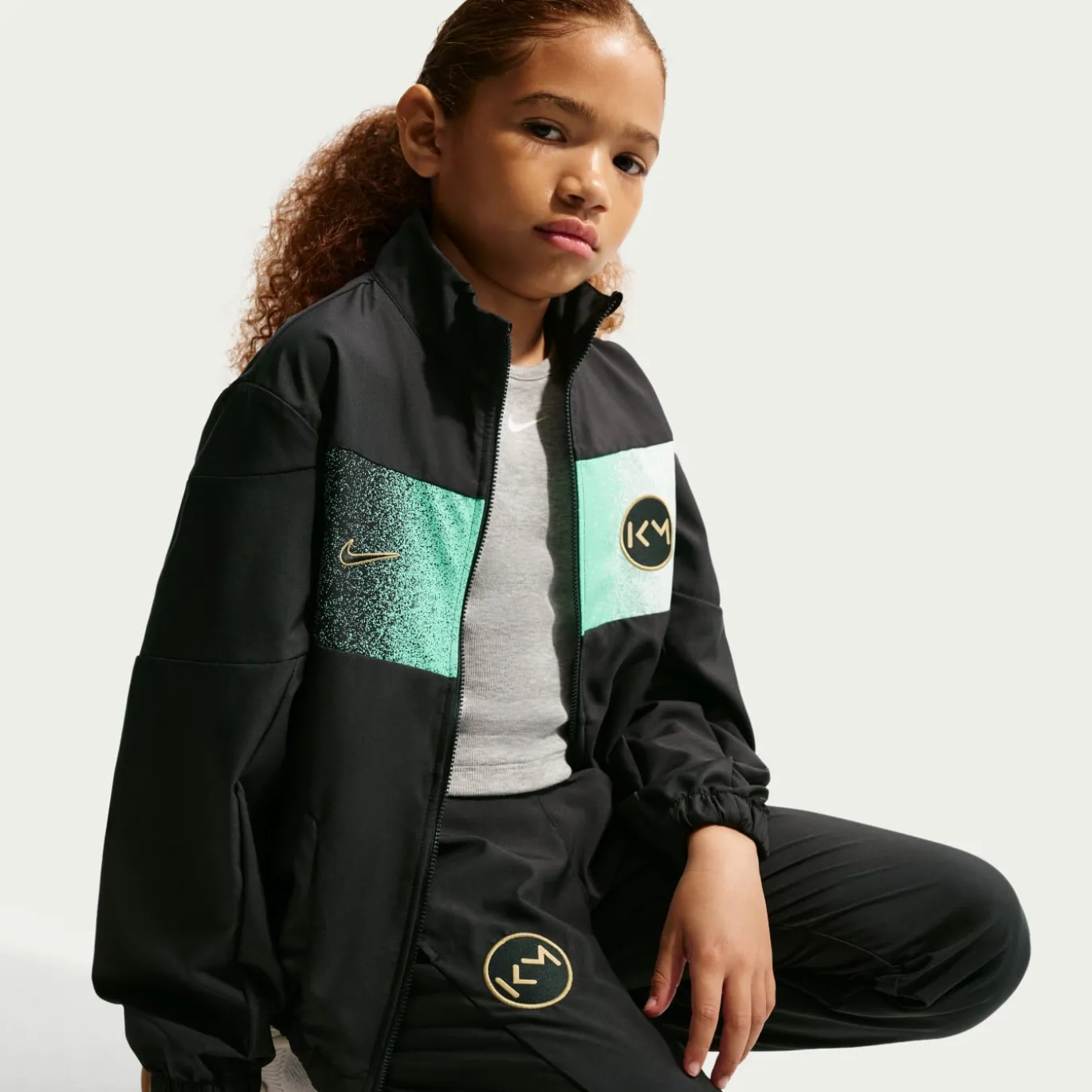 Nike Kylian Mbappé Woven Trainingspak Kids Zwart Mintgroen Goud
