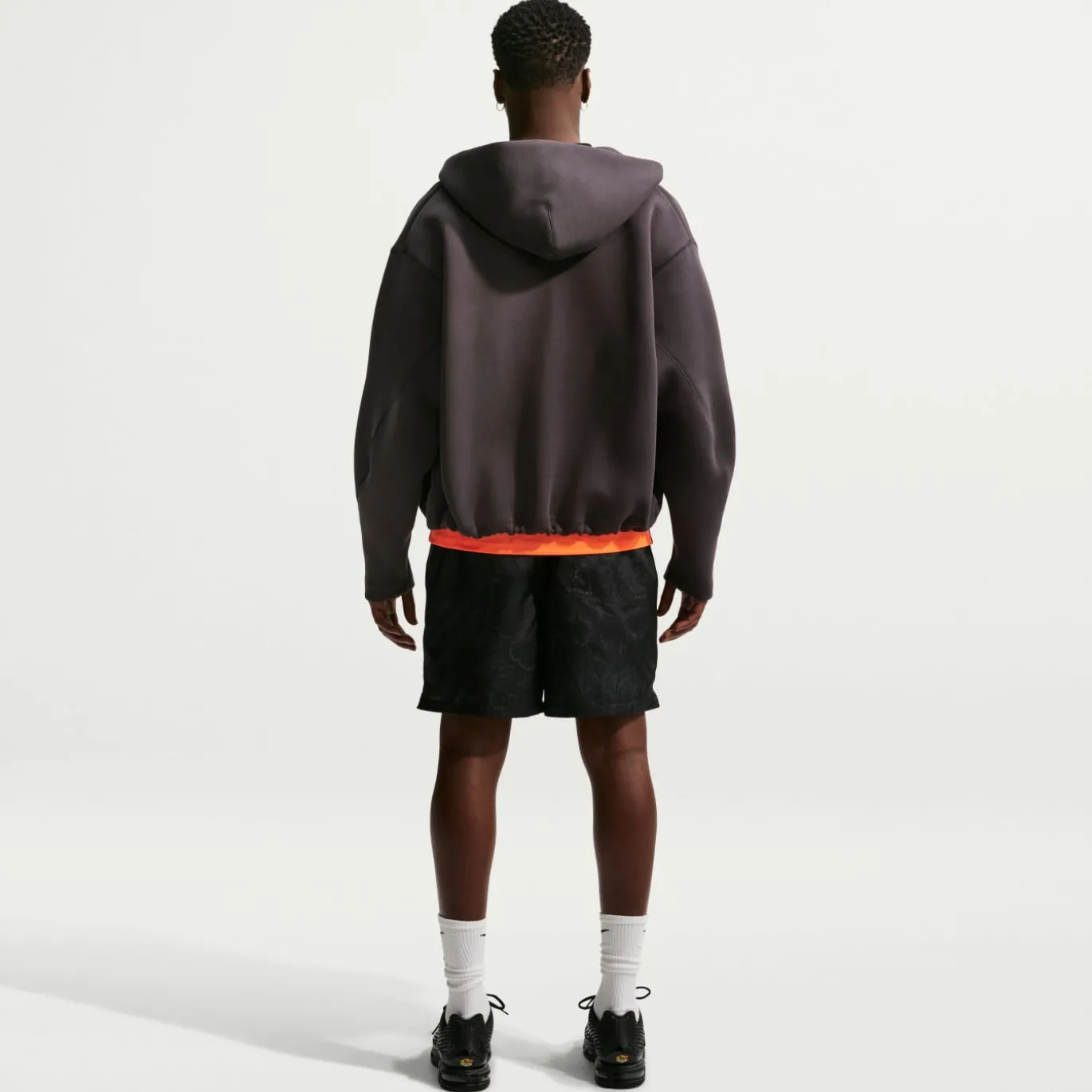 Nike Nederland Club Flow Broekje 2026-2028 Zwart Oranje
