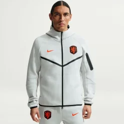 Nike Nederland Tech Fleece Trainingspak 2026-2028 Lichtgrijs Zwart Feloranje