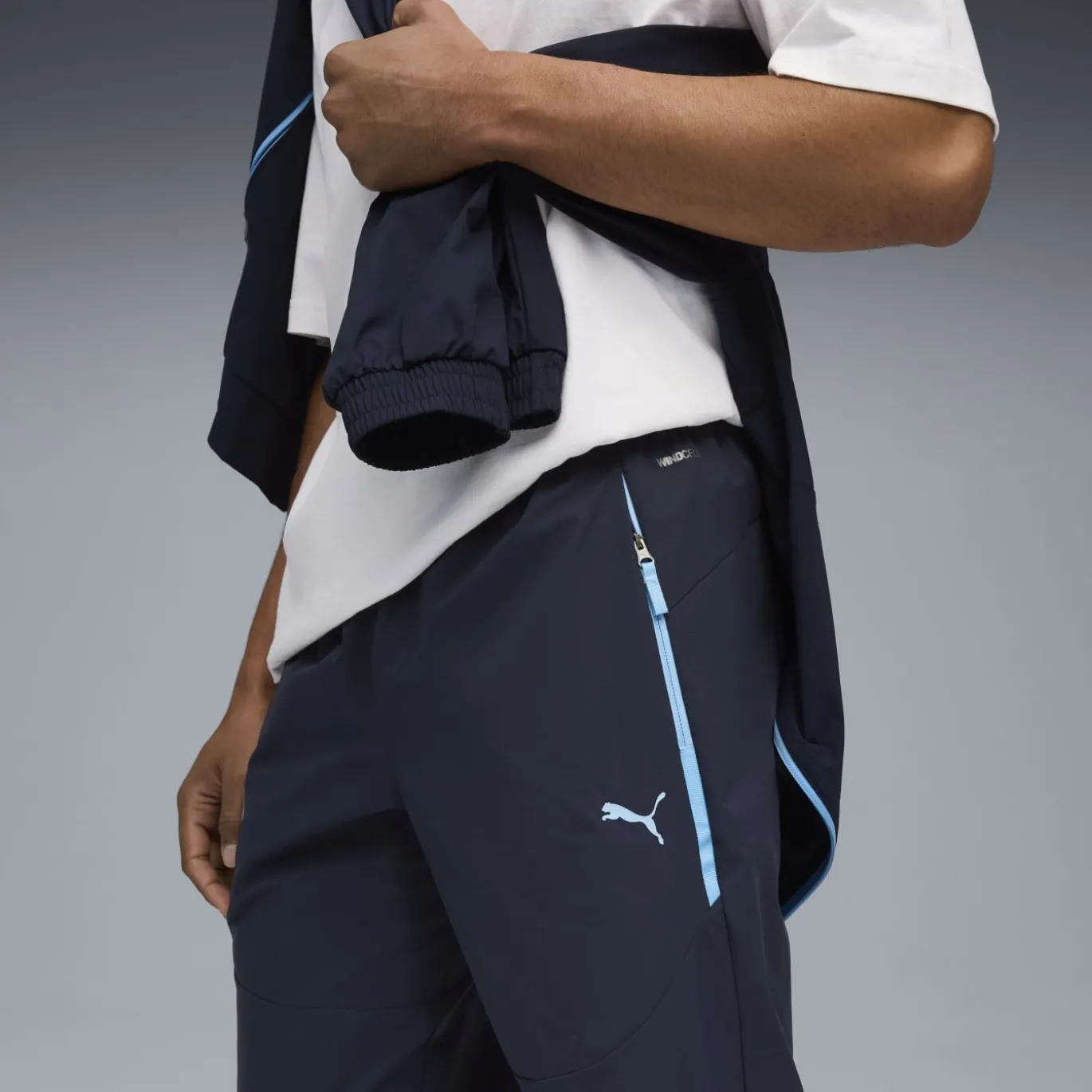PUMA Manchester City Pumatech Trainingsbroek Woven 2025-2026 Donkerblauw Lichtblauw