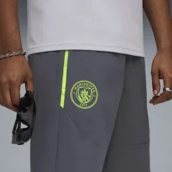 PUMA Manchester City Pumatech Trainingsbroek Woven 2025-2026 Grijs Groen