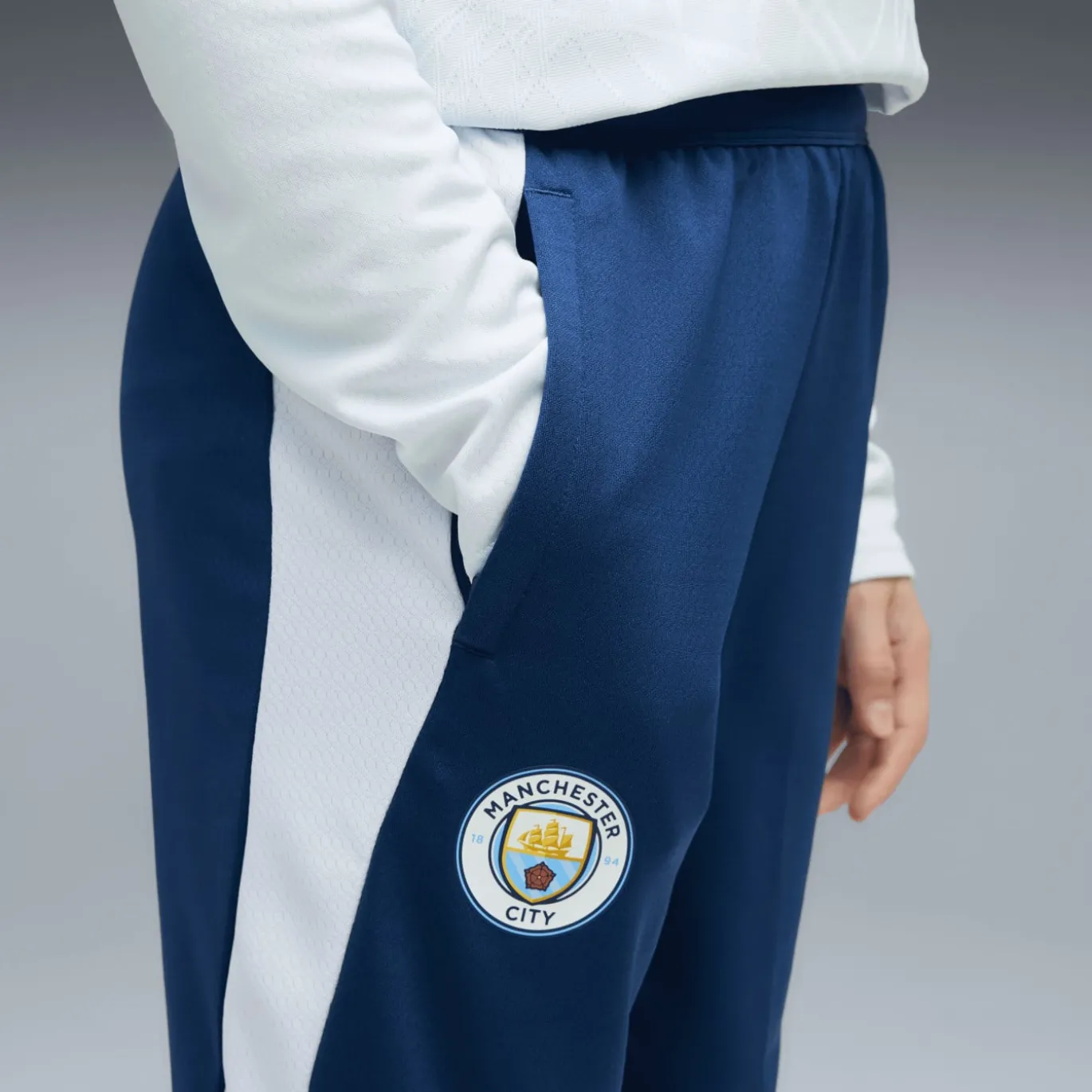 PUMA Manchester City Trainingsbroek 2026-2027 Kids Donkerblauw Lichtblauw
