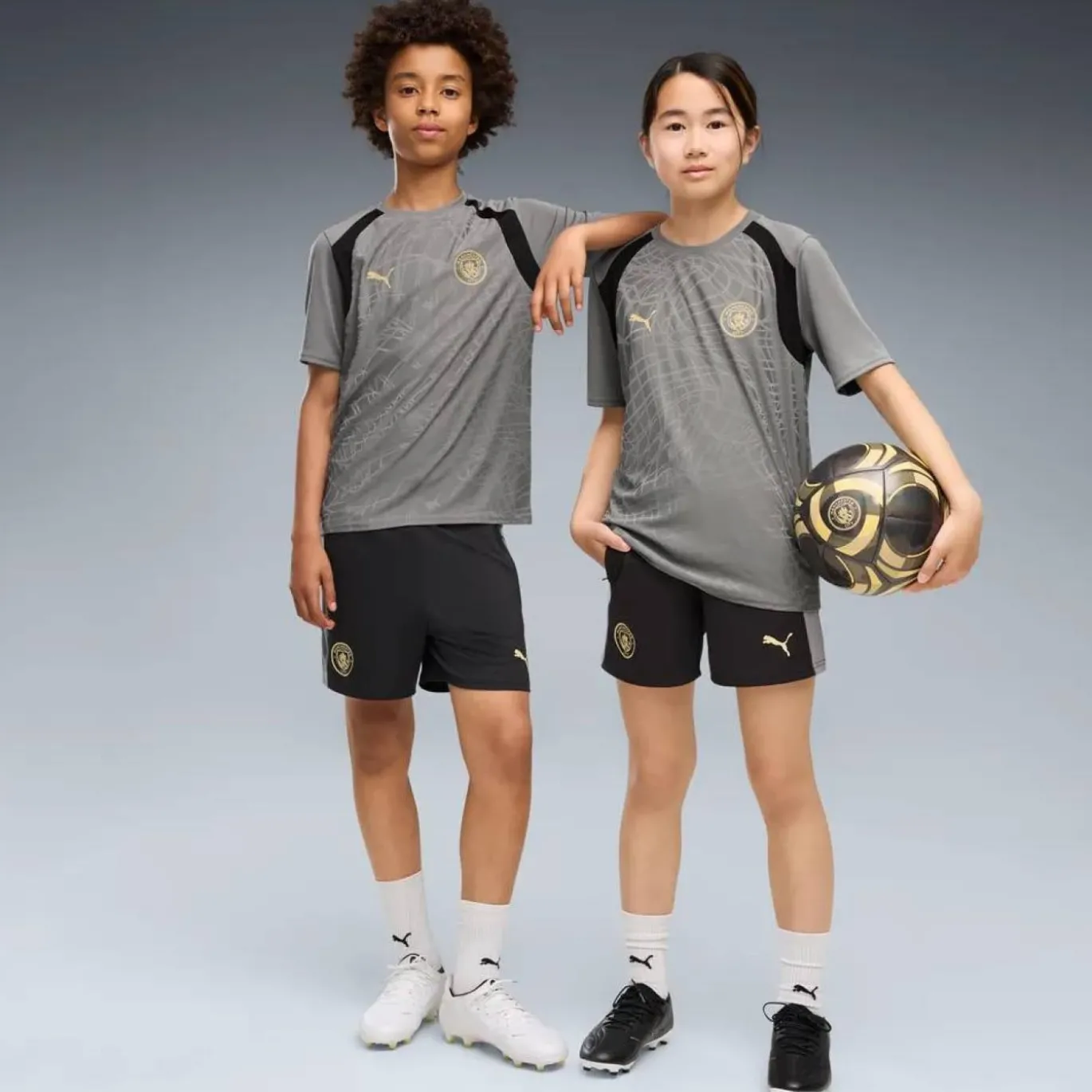 PUMA Manchester City Trainingsshirt 2026-2027 Kids Donkergrijs Zwart Goudgeel